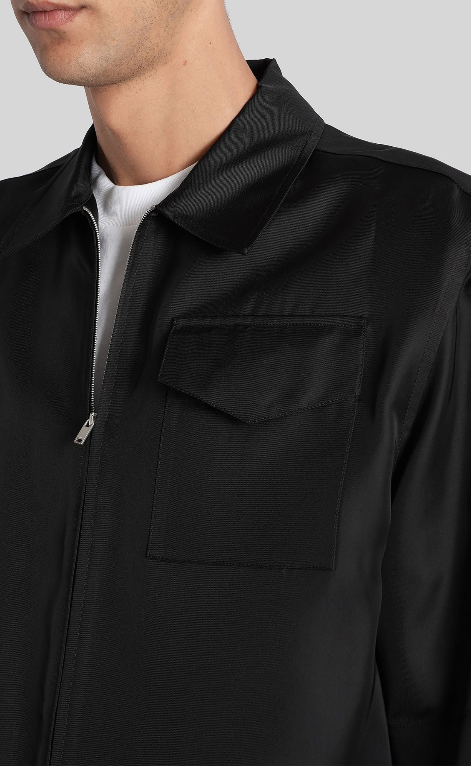 ZIP-FRONT RUFFLED BLACK SHIRT
