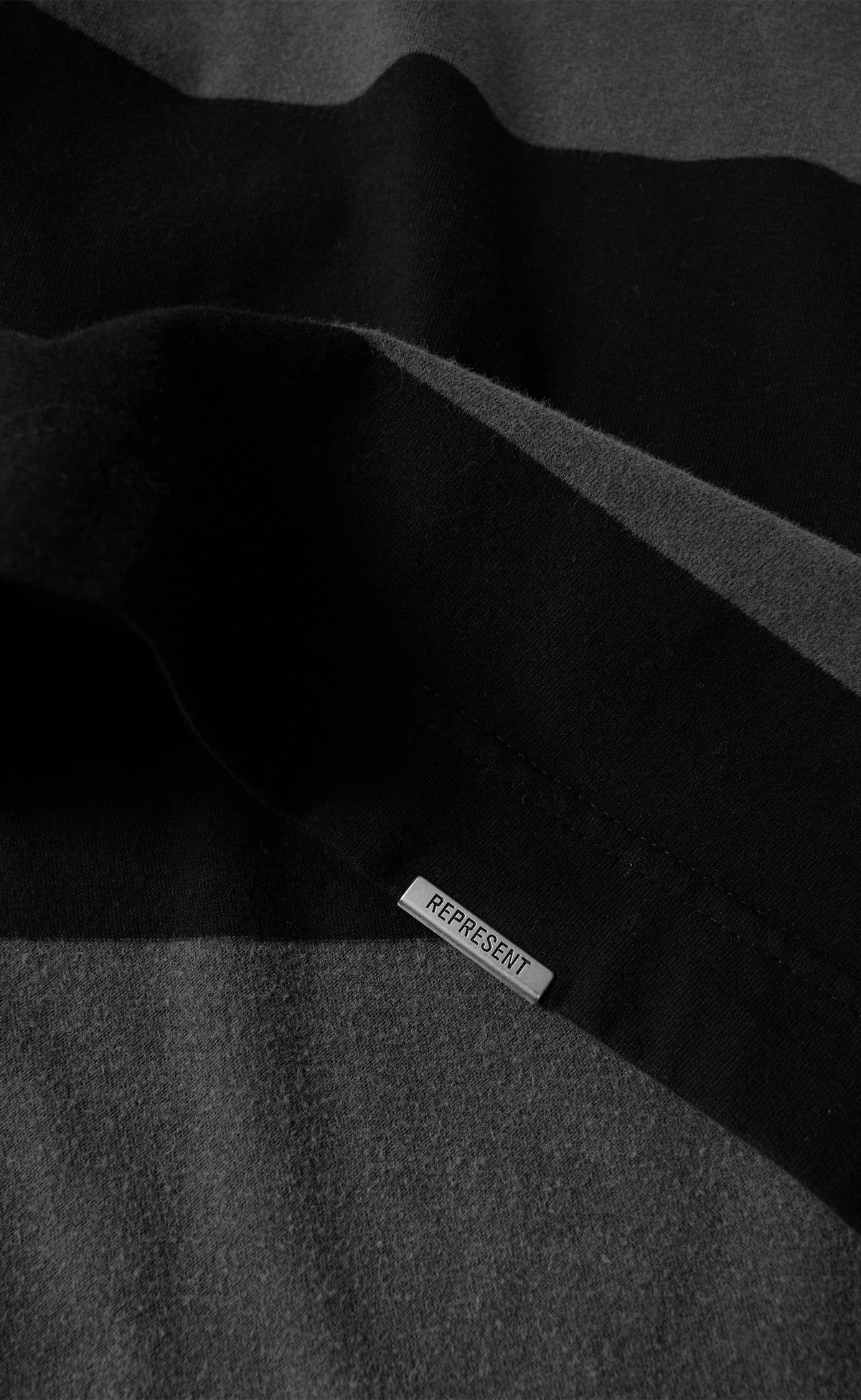OWNERS RUGBY STRIPE POLO JET BLACK LONGSLEEVE