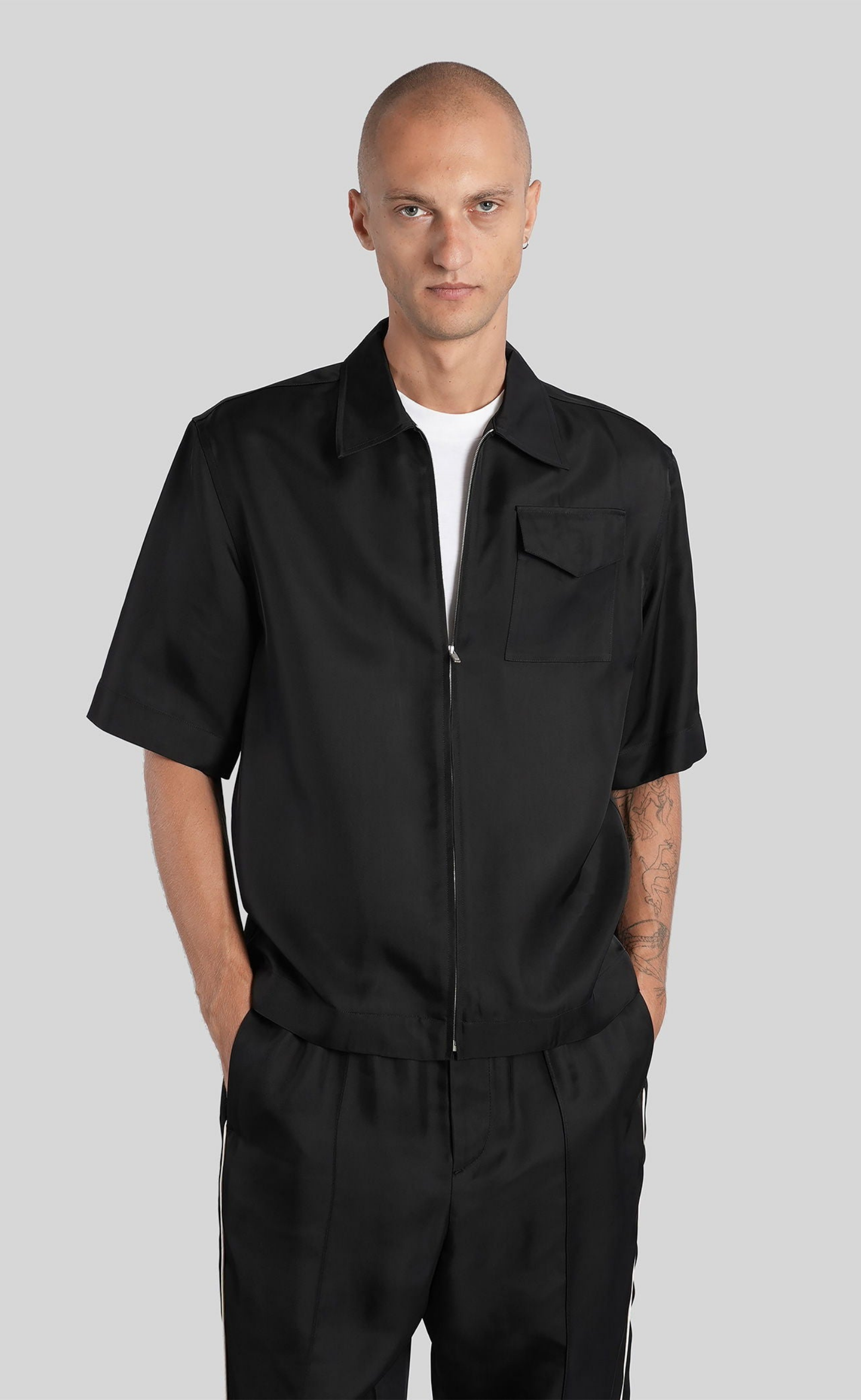 ZIP-FRONT RUFFLED BLACK SHIRT