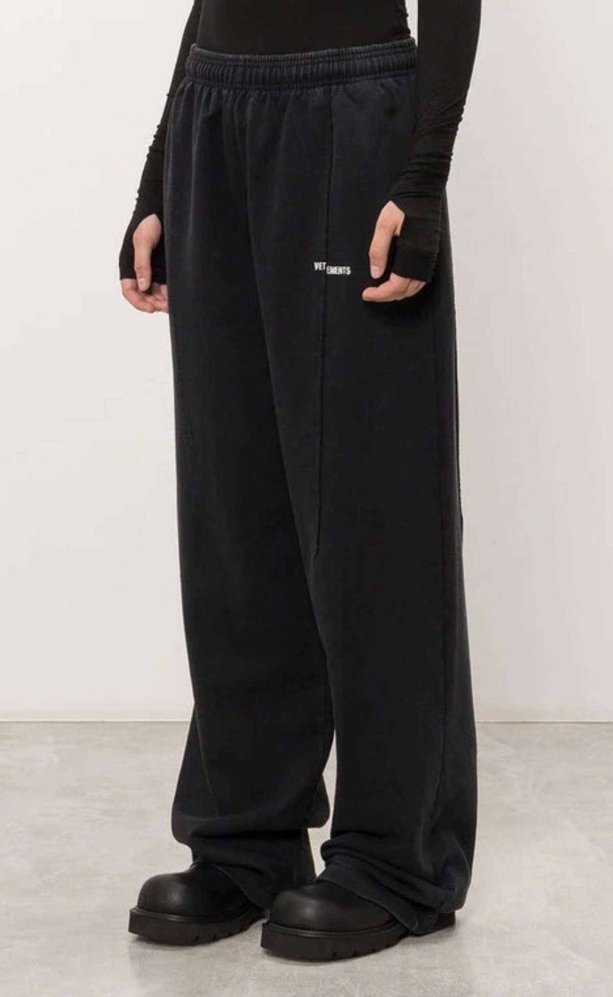 PINCHED CUT-UP WASHED BLACK SWEATPANTS