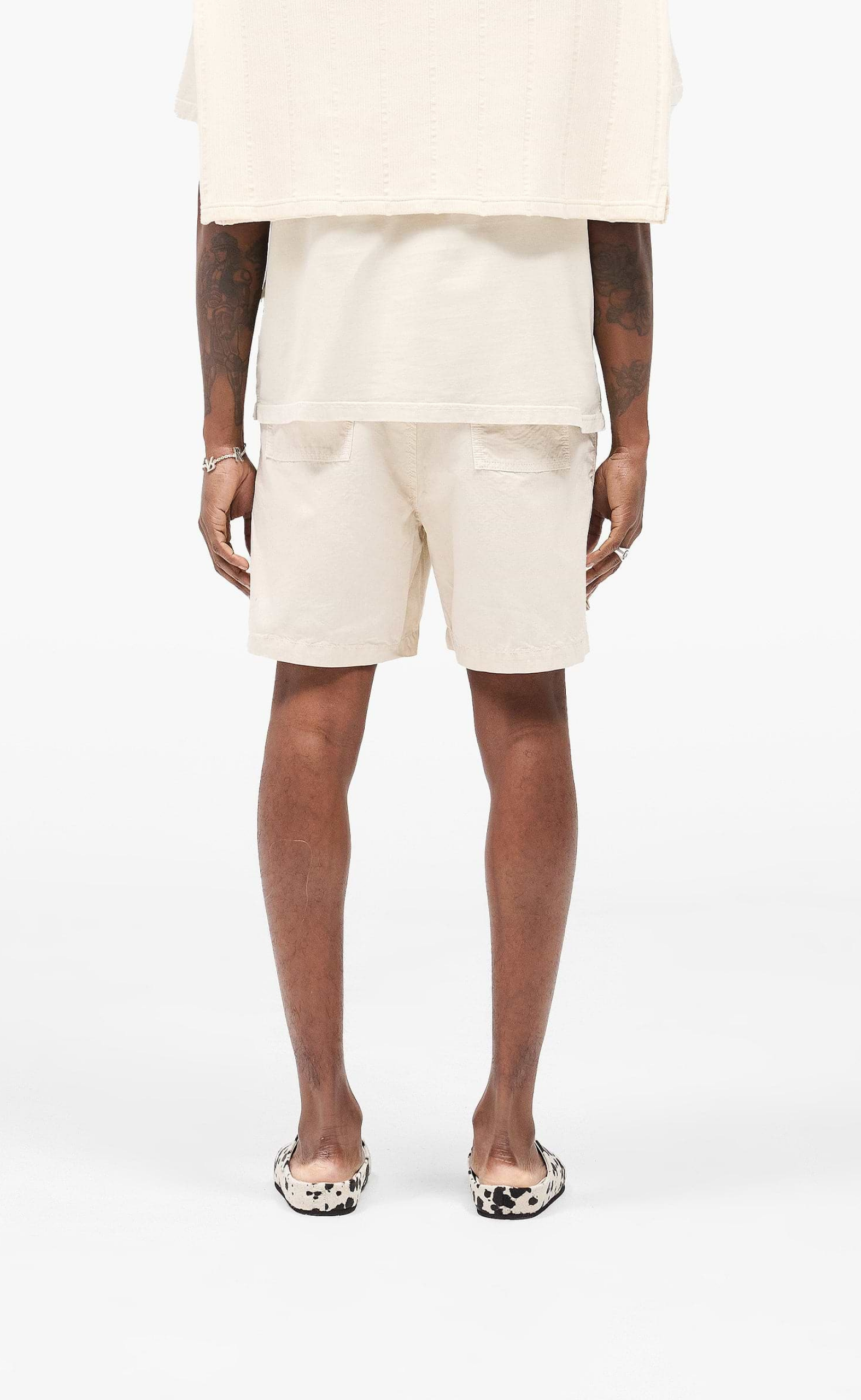FRONT POCKET CARGO CHAMOAGNE SHORTS