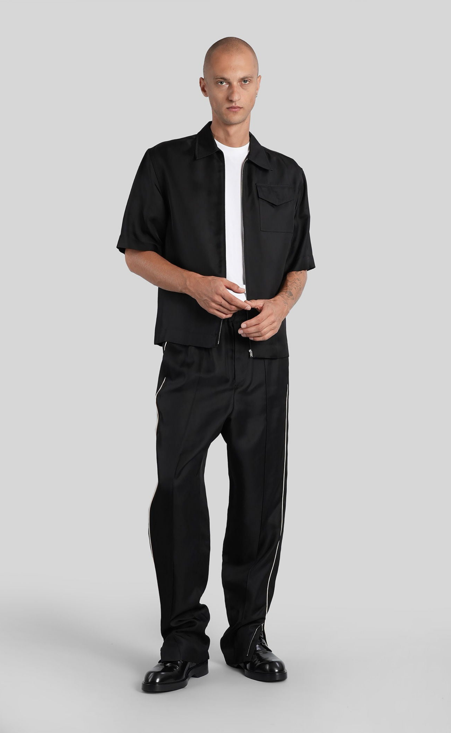 ZIP-FRONT RUFFLED BLACK SHIRT