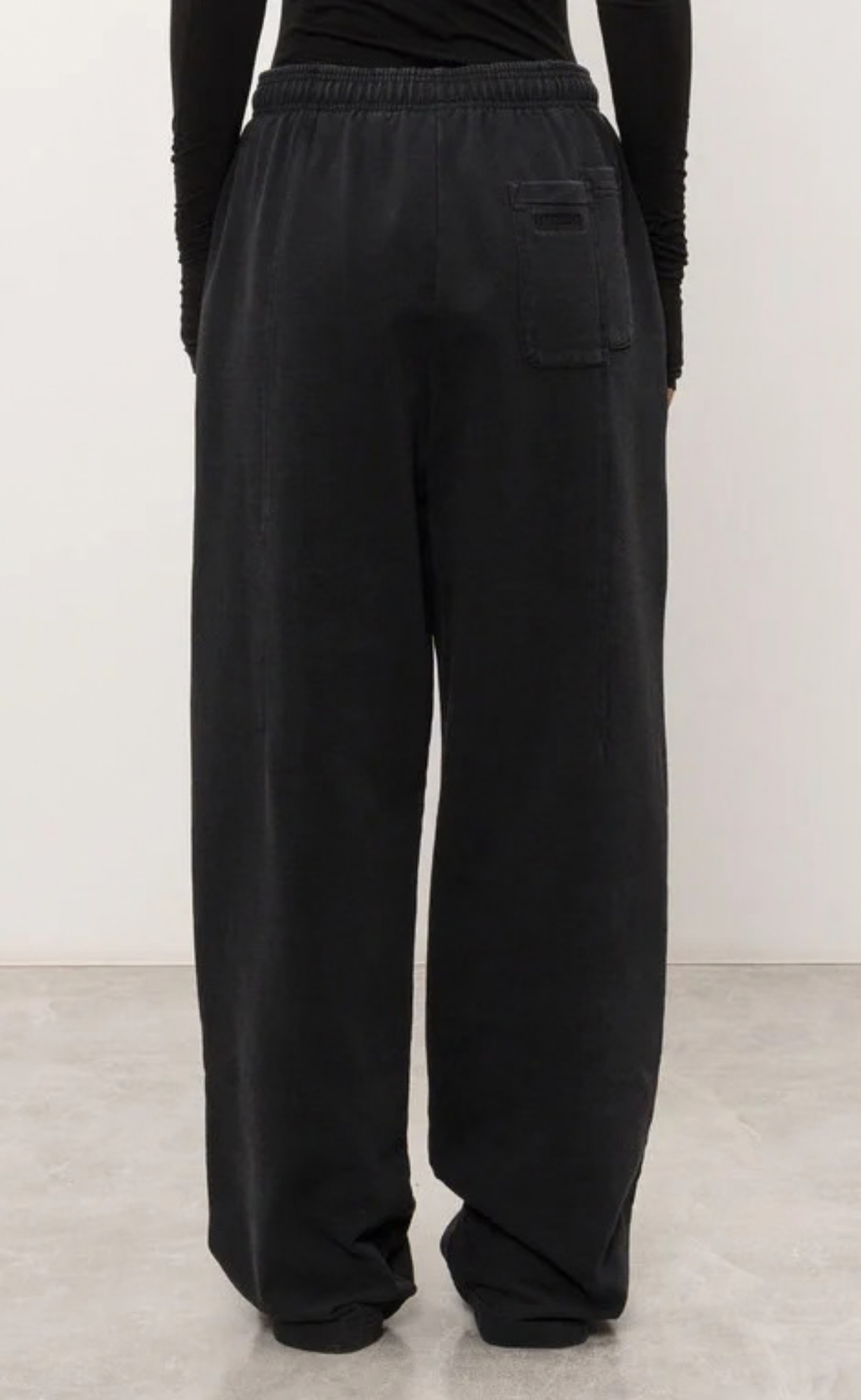 PINCHED CUT-UP WASHED BLACK SWEATPANTS