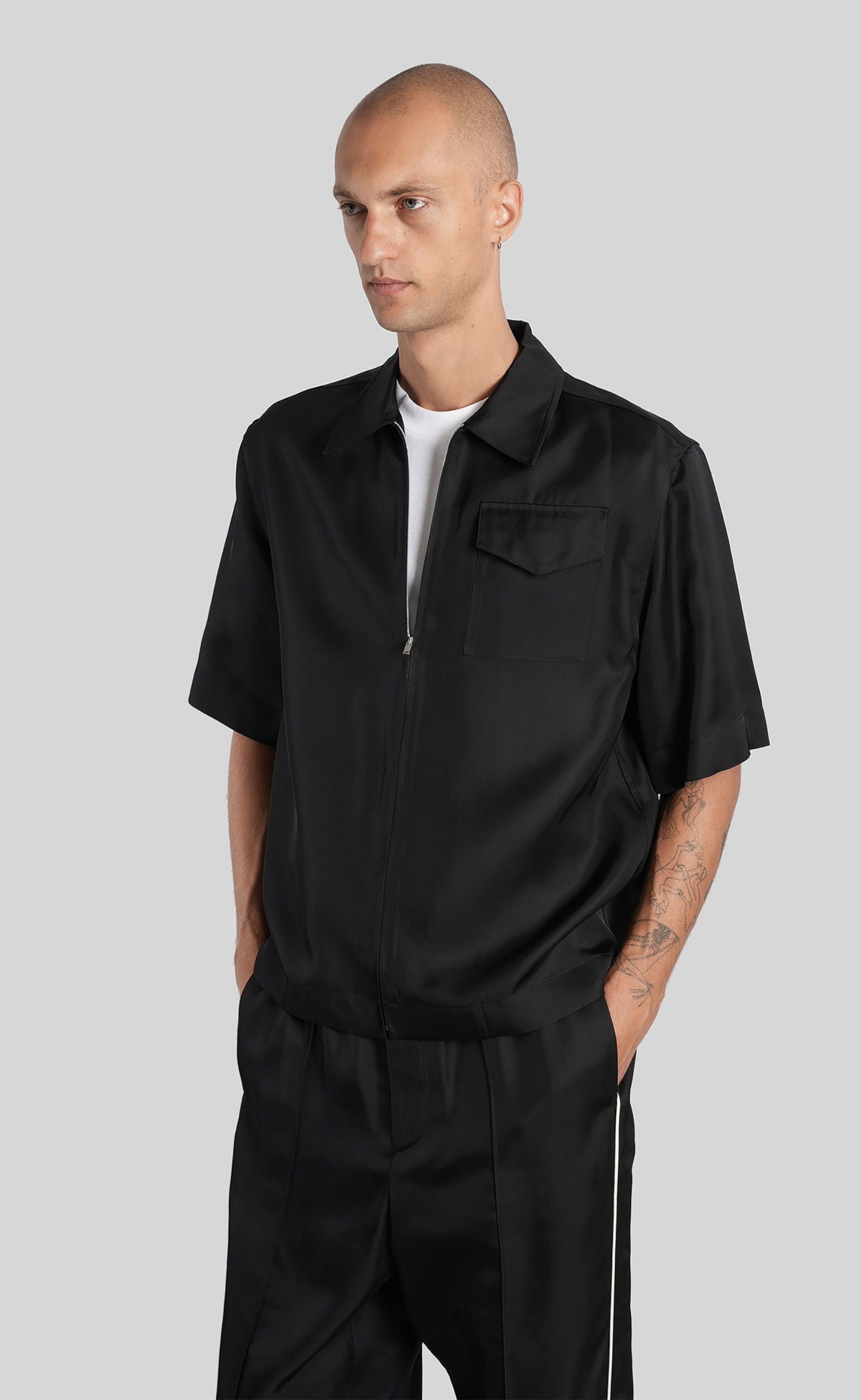 ZIP-FRONT RUFFLED BLACK SHIRT