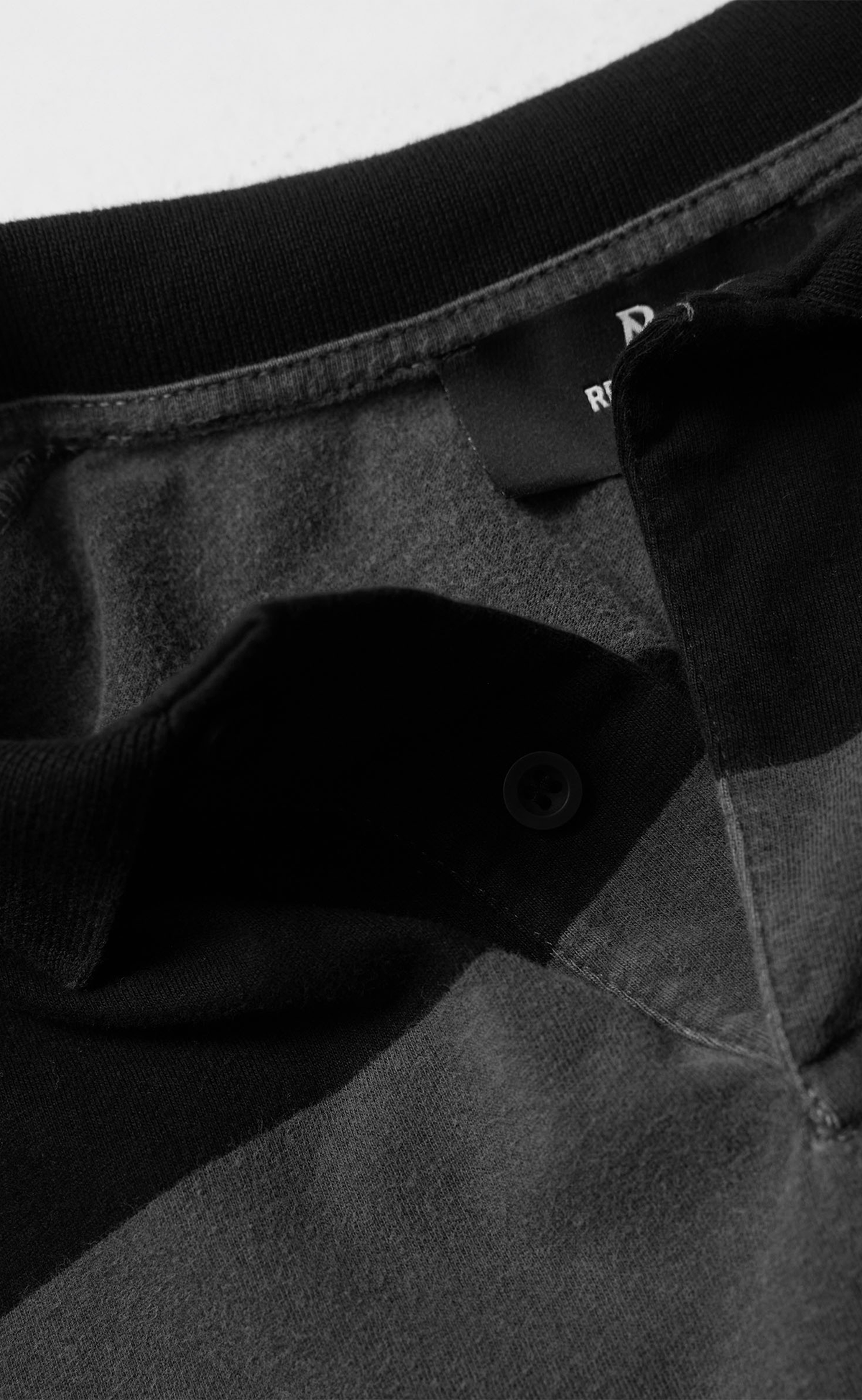 OWNERS RUGBY STRIPE POLO JET BLACK LONGSLEEVE
