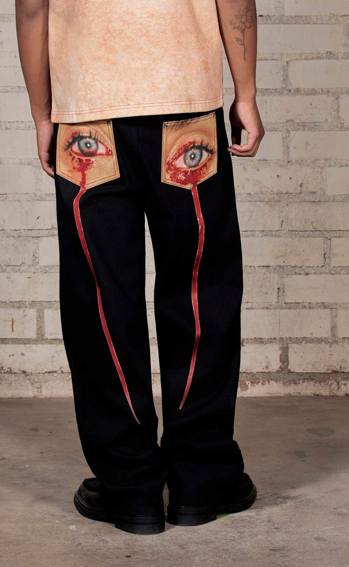 TEAR FORMULA BAGGY BLACK JEANS