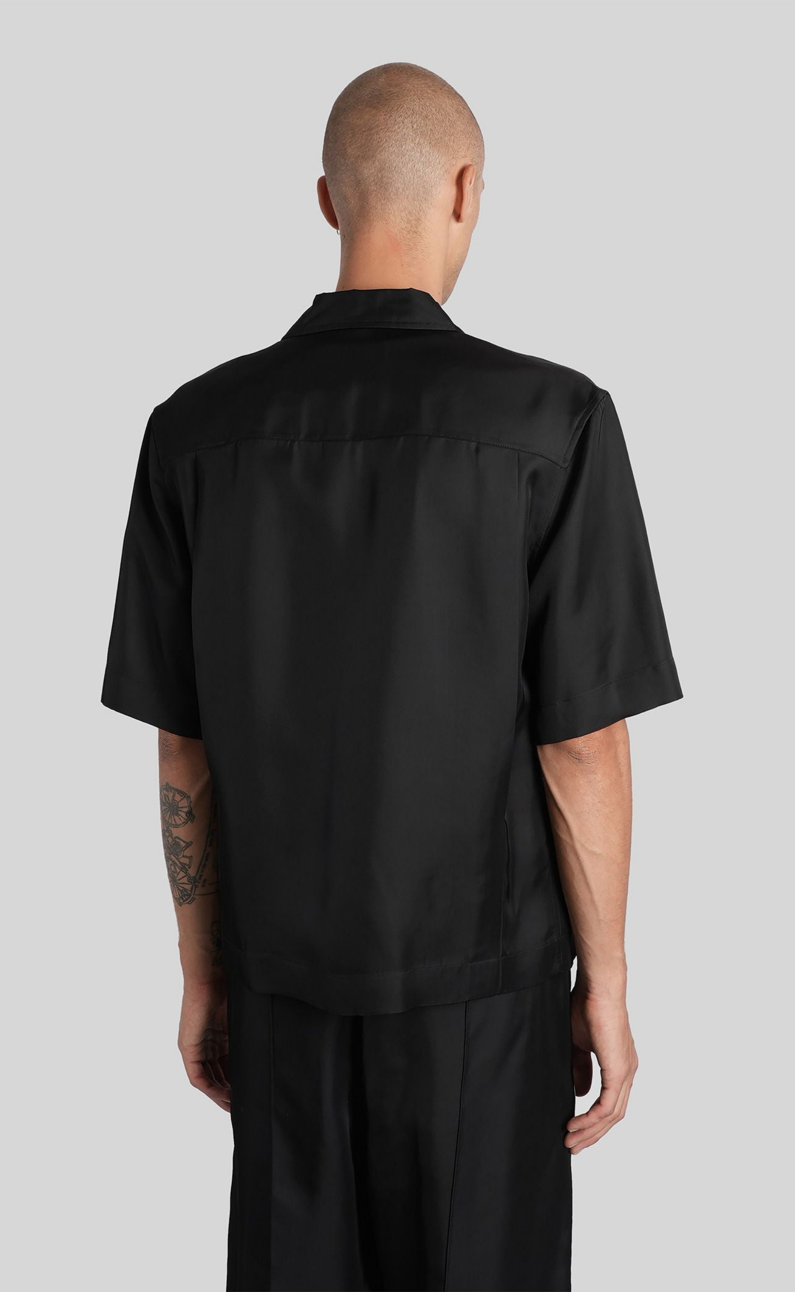 ZIP-FRONT RUFFLED BLACK SHIRT