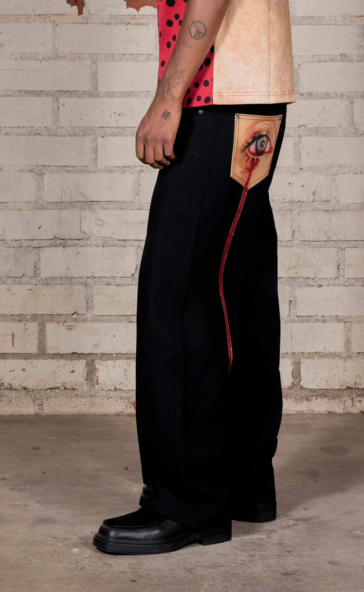TEAR FORMULA BAGGY BLACK JEANS